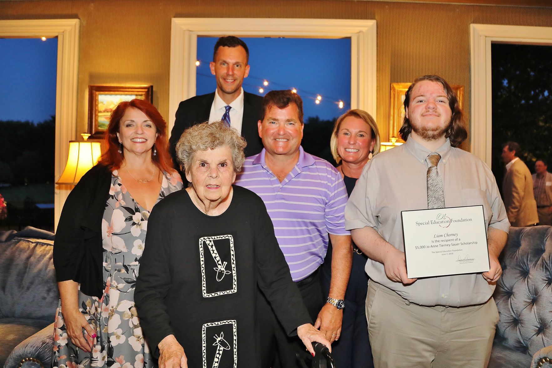 Eileen Loeerre, Rkuth Nelson, Rick Brennen, Dave and Suzie Spence, Scholarship Awardee: Liam Chorney